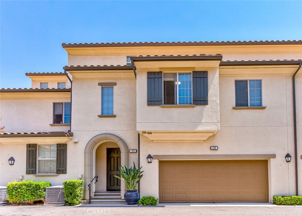 135 Silverado Irvine, CA 92618 - Photo 19 of 23 a front view of a house with garden