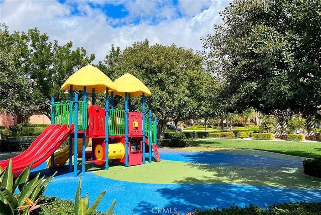 135 Silverado Irvine, CA 92618 - Photo 23 of 23 a view of an outdoor space with swimming pool and trees