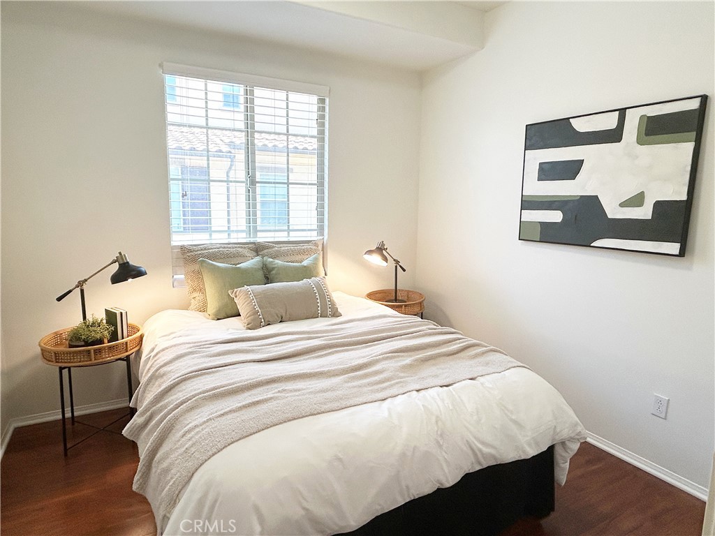 135 Silverado Irvine, CA 92618 - Photo 4 of 23 a bedroom with a bed and painting on the wall