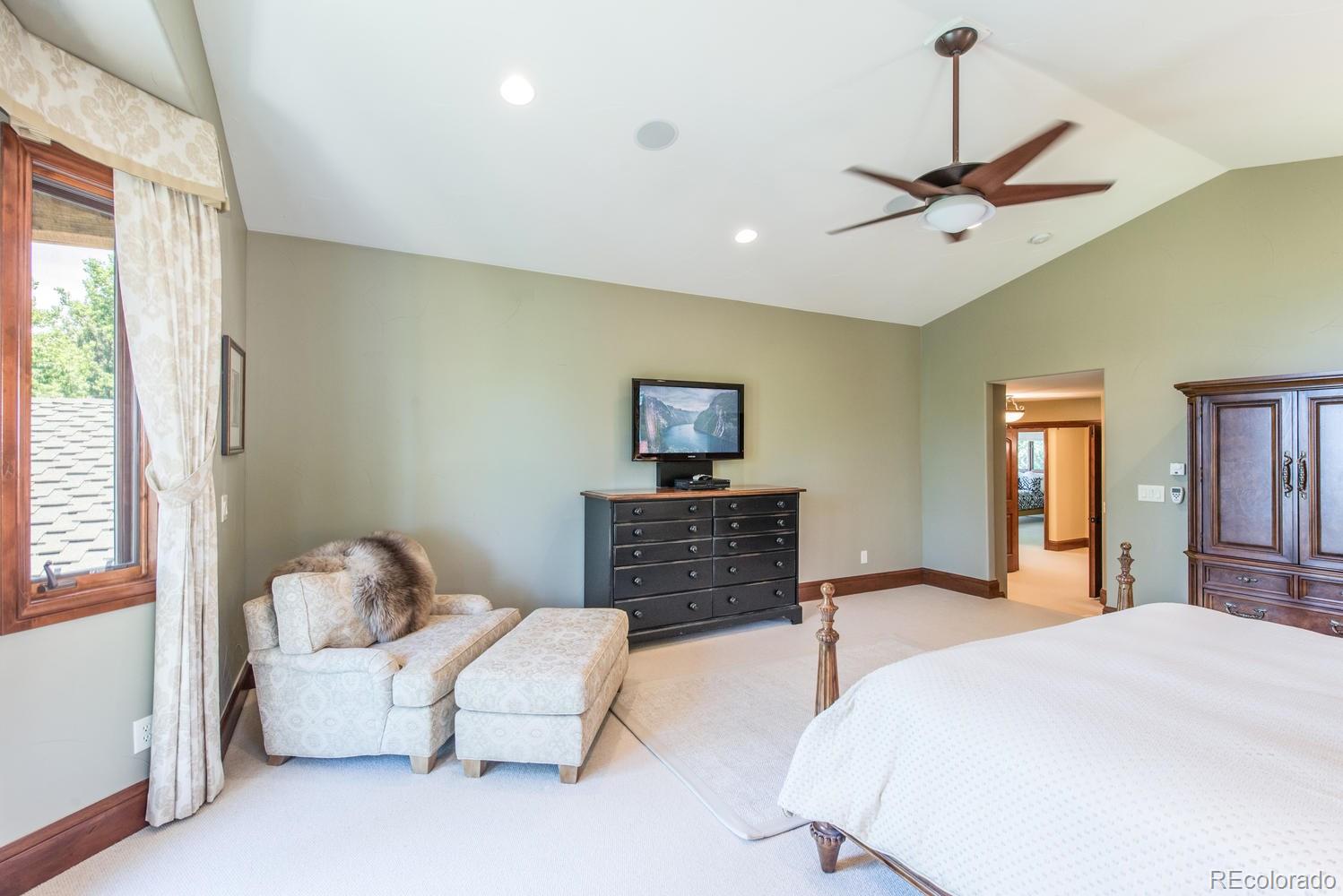 45 West Ranch Trail Morrison, CO 80465 - Photo 17 of 35 a bedroom with furniture and a window