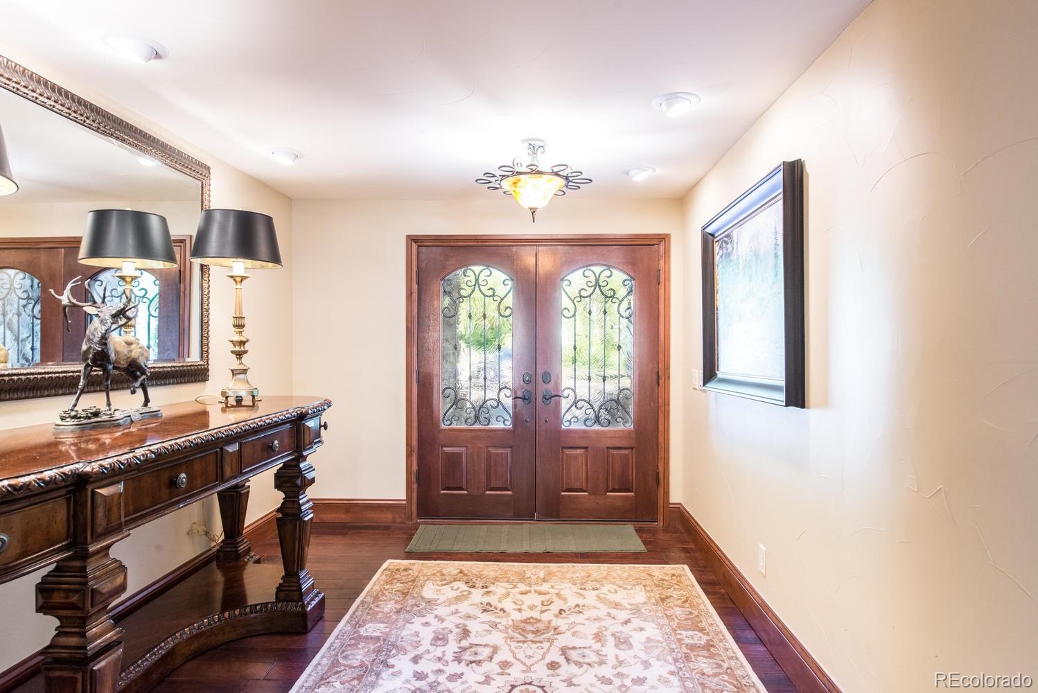 45 West Ranch Trail Morrison, CO 80465 - Photo 8 of 35 a very nice looking room with a large window