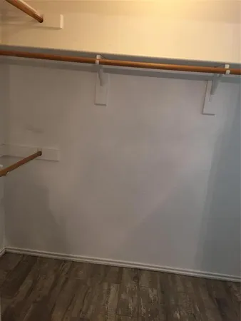 a view of small space with racks on the wall