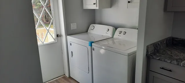 a bathroom with a sink and mirror