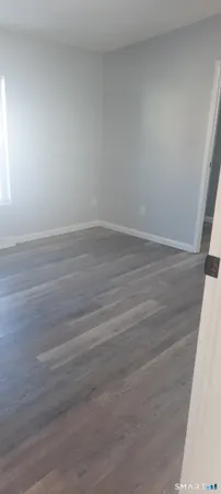 a bathroom with a sink a toilet and bathtub