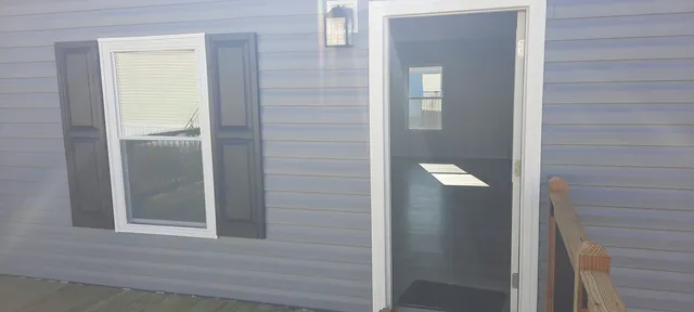 a kitchen with a sink and a stove top oven