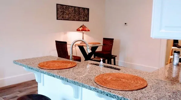 a room with furniture and a chair