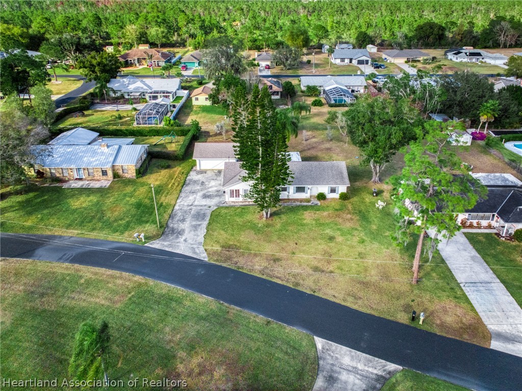 3407 Divot Road Sebring, FL 33872 - Photo 35 of 39 an aerial view of residential houses with outdoor space