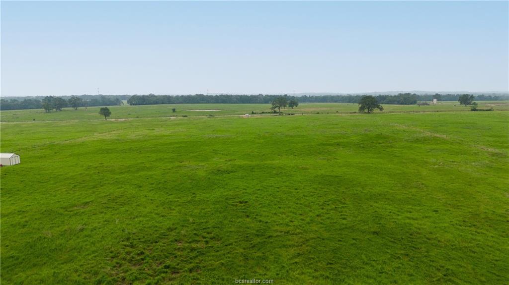 16023 Reagan Loop Franklin, TX 77856 - Photo 2 of 9 a view of a field with an ocean