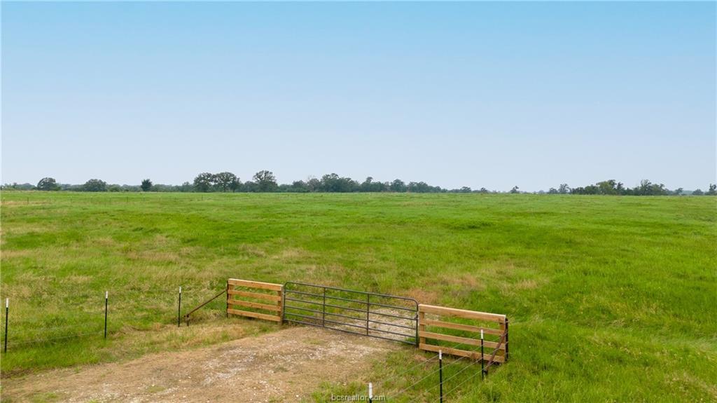 16023 Reagan Loop Franklin, TX 77856 - Photo 7 of 9 a view of a bench in an outdoor space