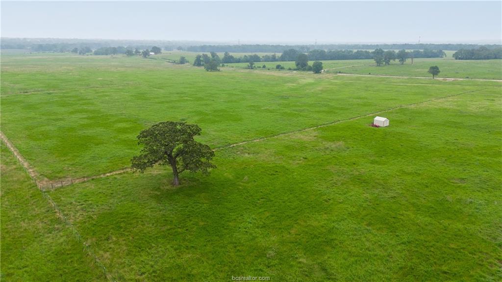 16023 Reagan Loop Franklin, TX 77856 - Photo 9 of 9 a view of an ocean and a yard
