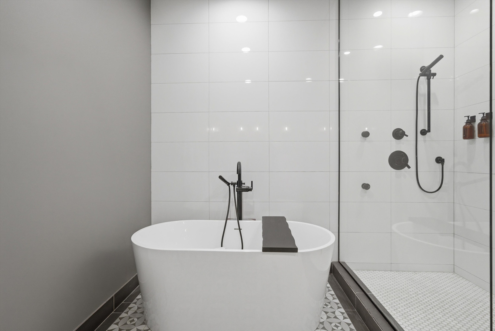 855 North Wolcott Avenue, Unit 1 Chicago, IL 60622 - Photo 27 of 34 a bathroom with a bathtub and shower