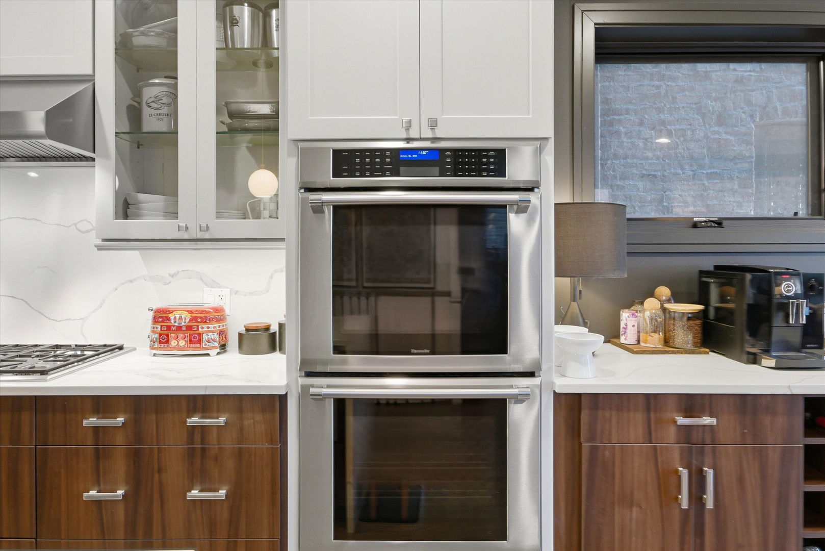855 North Wolcott Avenue, Unit 1 Chicago, IL 60622 - Photo 6 of 34 a kitchen with a stove and a microwave