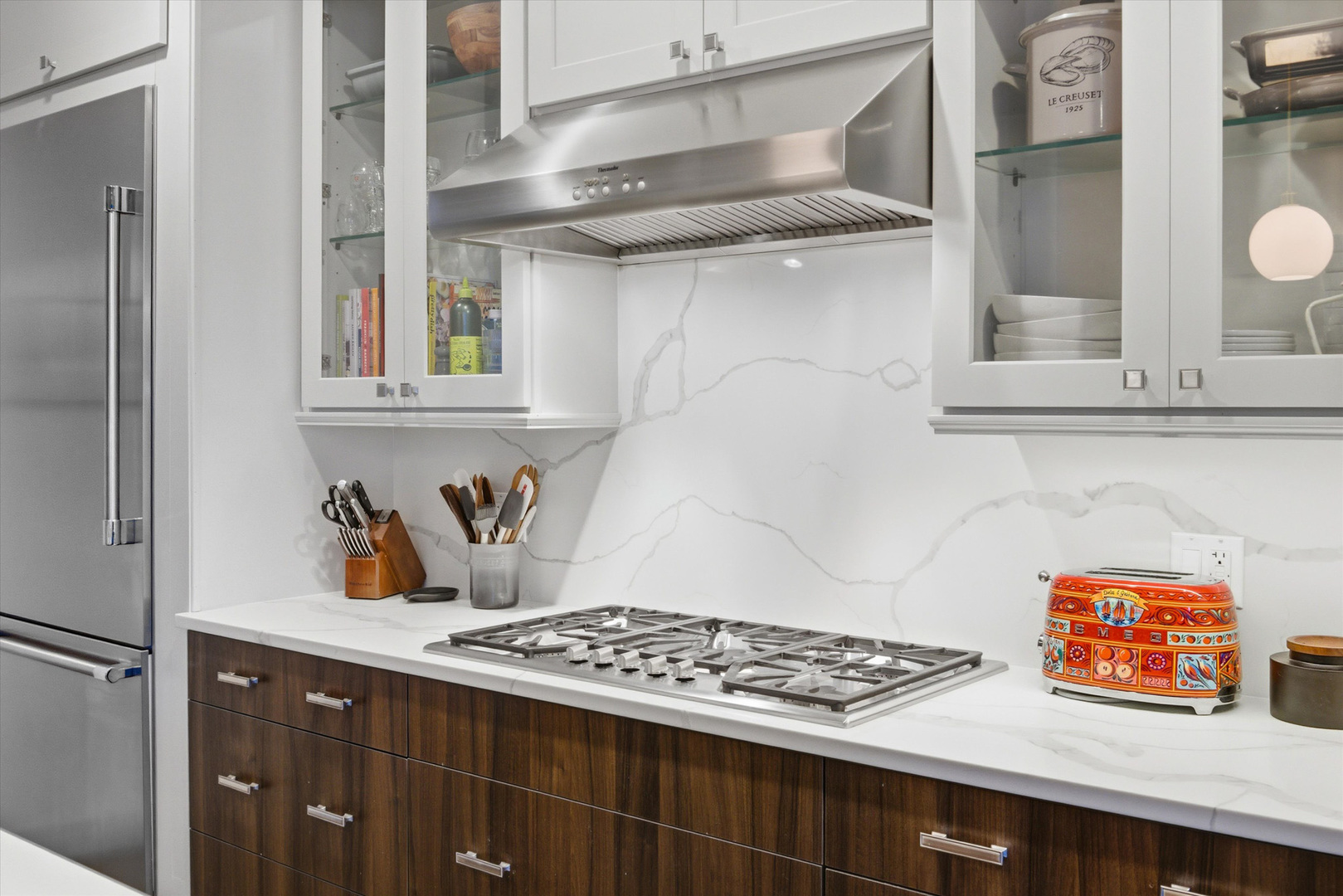 855 North Wolcott Avenue, Unit 1 Chicago, IL 60622 - Photo 7 of 34 a kitchen with stainless steel appliances granite countertop a stove and a microwave