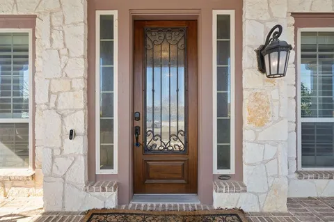 a front view of a house with a shower