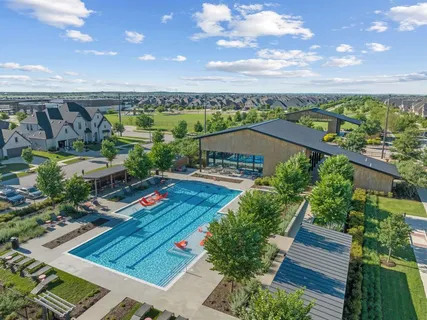 a picture of a bathroom with a shower