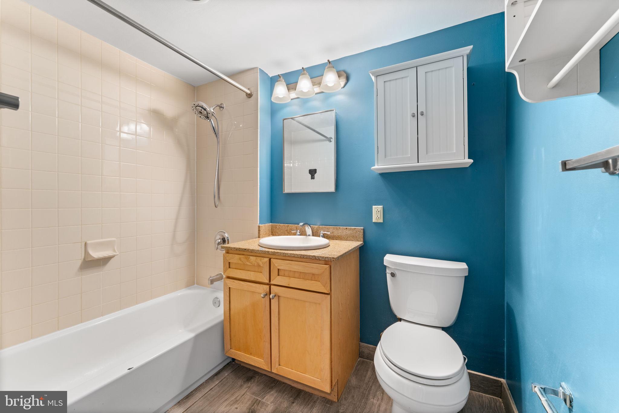 1150 K Street Northwest, Unit 306 Washington, DC 20005 - Photo 12 of 20 Bathroom with shower and tub