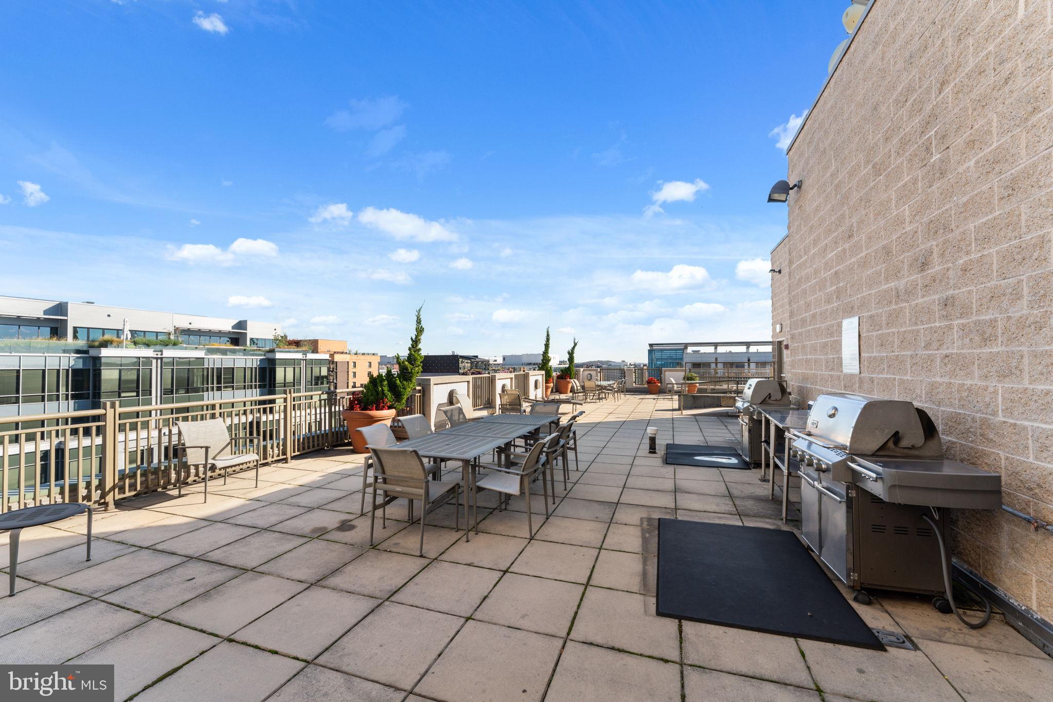 1150 K Street Northwest, Unit 306 Washington, DC 20005 - Photo 16 of 20 Rooftop with barbecue