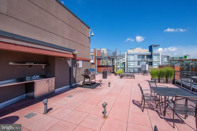 a view of a chairs and tables in the patio