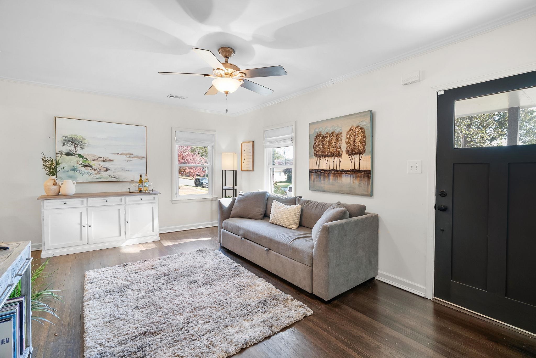 4780 Amboy Road Memphis, TN 38117 - Photo 12 of 32 a living room with furniture and a painting on the wall