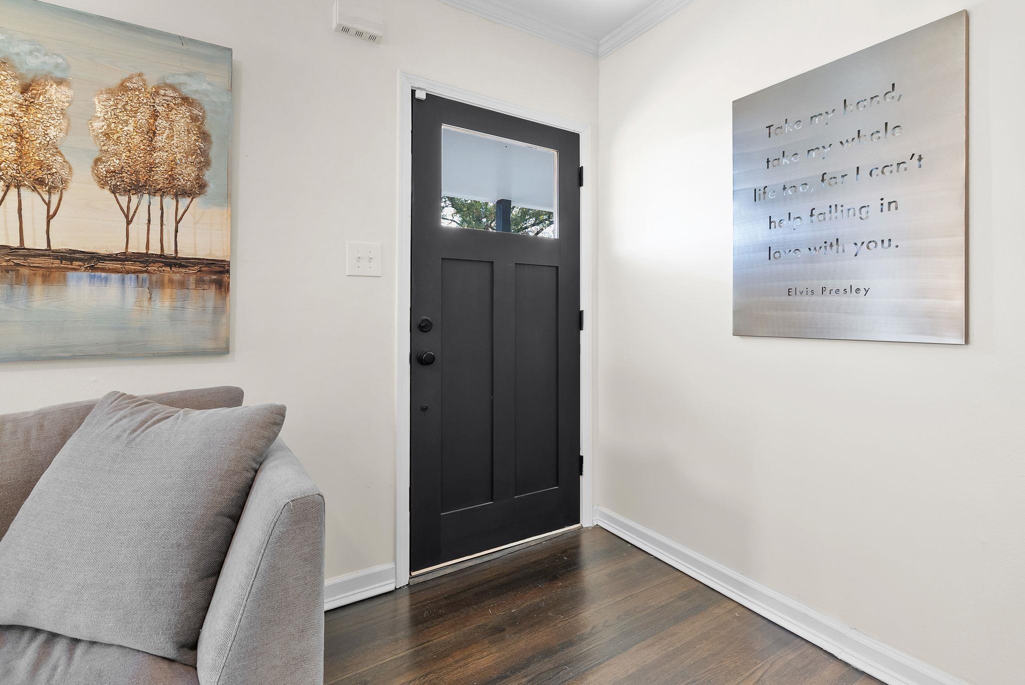 4780 Amboy Road Memphis, TN 38117 - Photo 10 of 32 a view of hallway with window and wooden floor