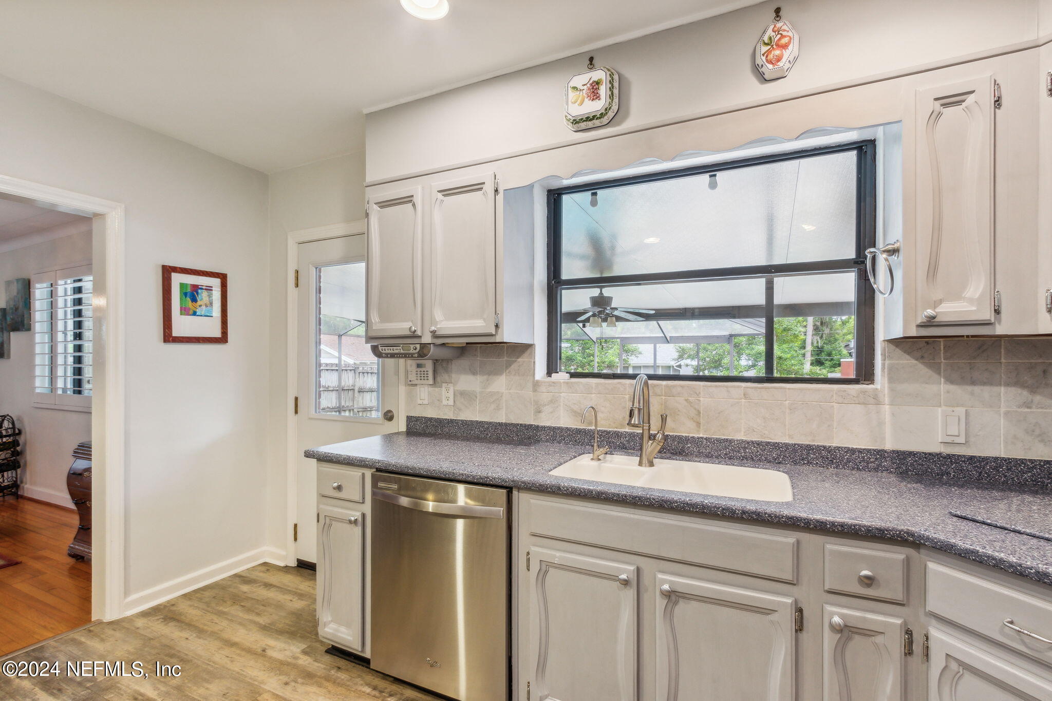 1605 Brookwood Road Jacksonville, FL 32207 - Photo 15 of 40 a kitchen with a sink and a window