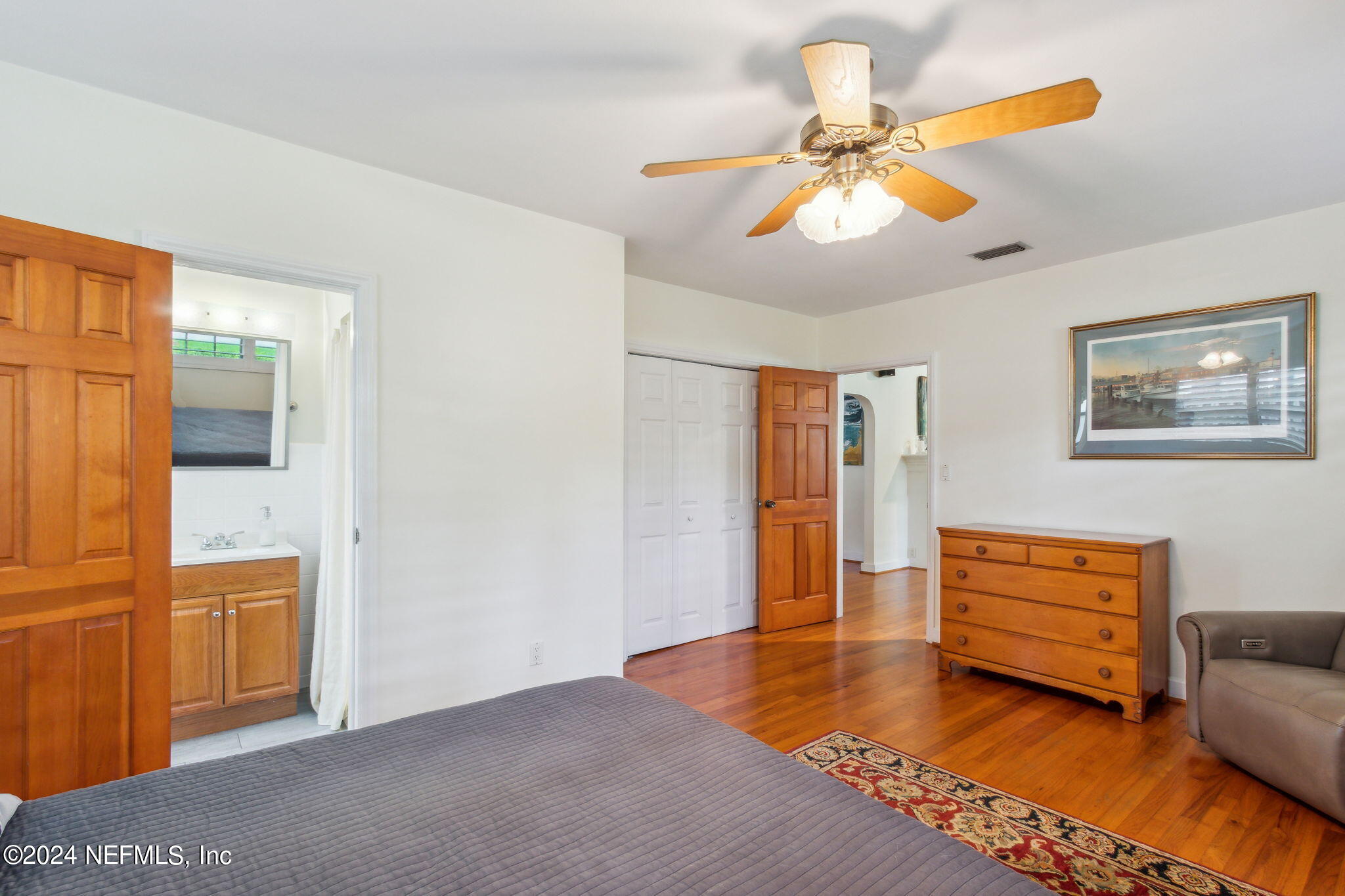 1605 Brookwood Road Jacksonville, FL 32207 - Photo 18 of 40 a living room with furniture and a chandelier