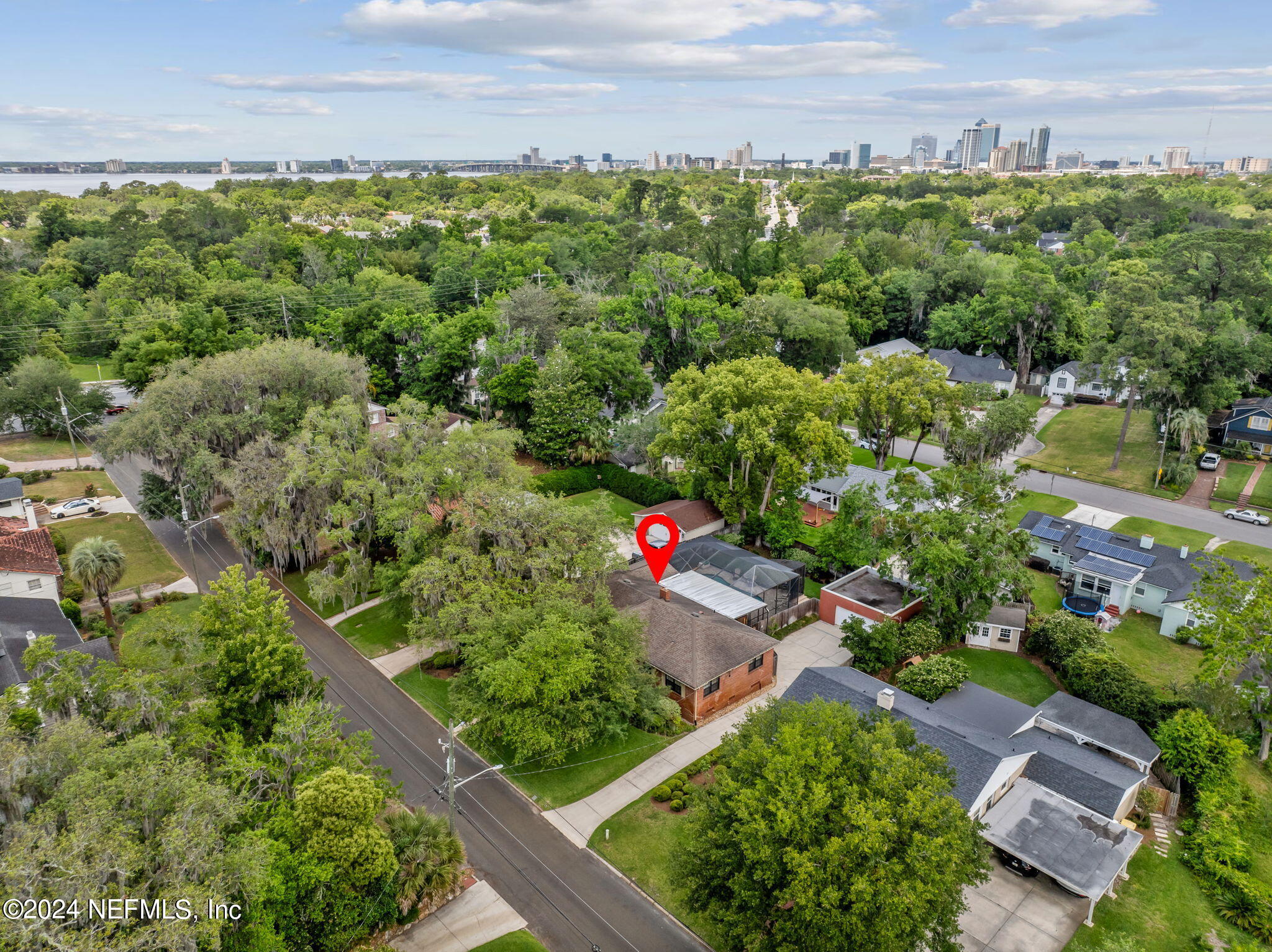 1605 Brookwood Road Jacksonville, FL 32207 - Photo 2 of 40 an aerial view of a houses with a yard