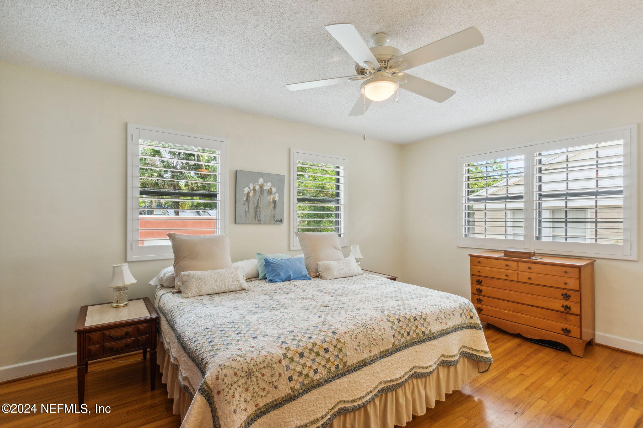 1605 Brookwood Road Jacksonville, FL 32207 - Photo 23 of 40 a bedroom with a large bed and a window