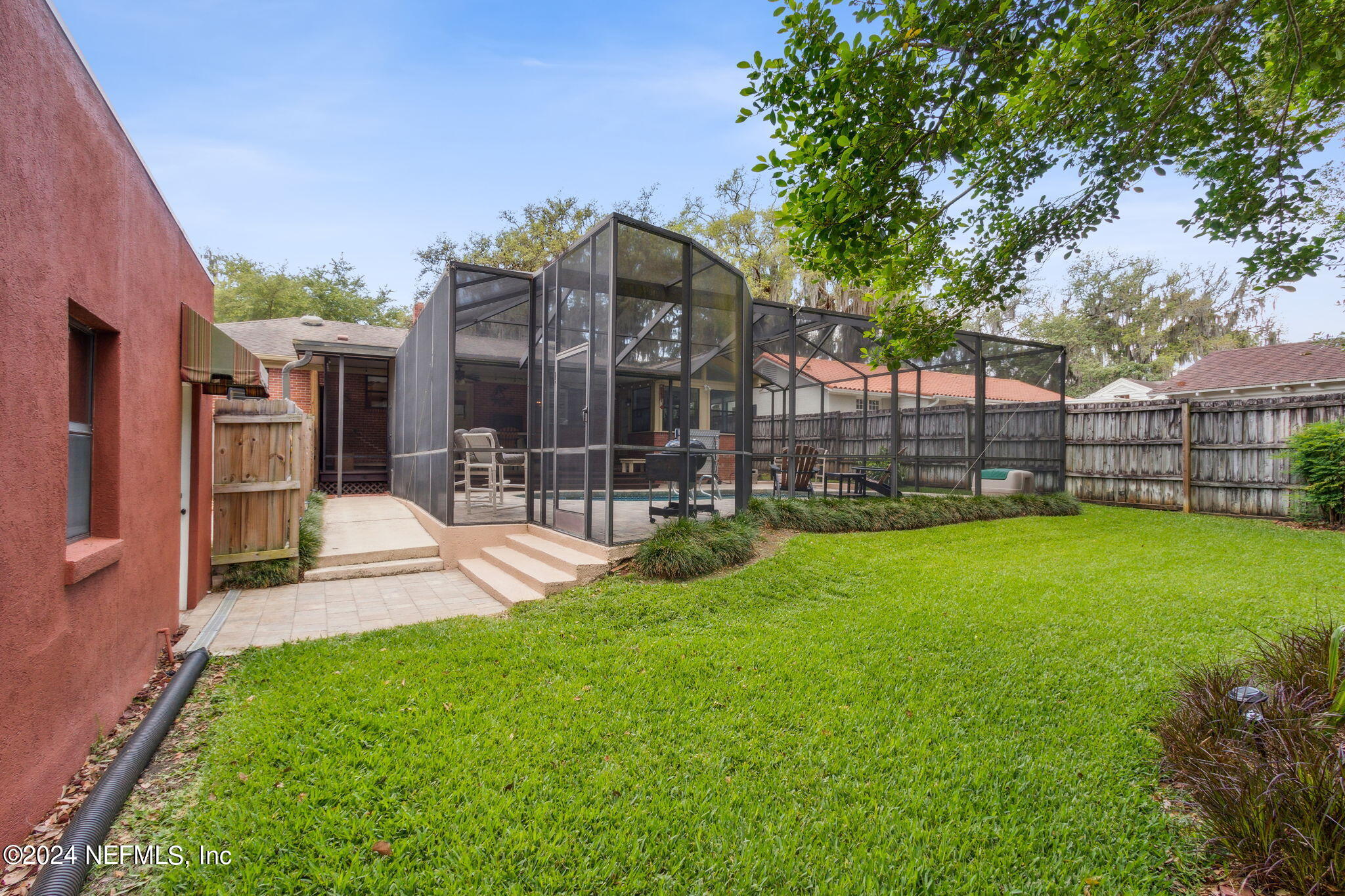 1605 Brookwood Road Jacksonville, FL 32207 - Photo 29 of 40 a view of a backyard with a garden and plants