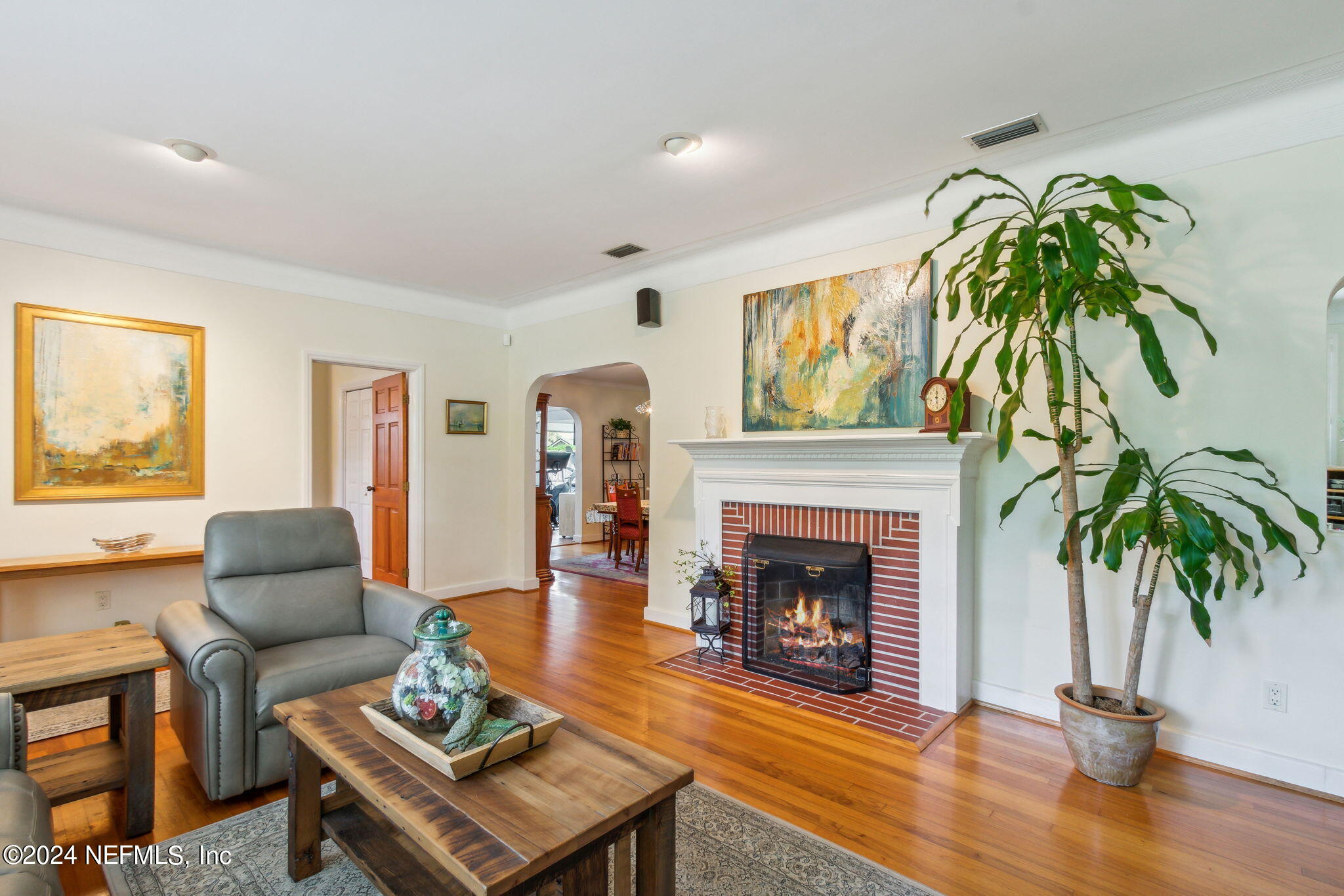 1605 Brookwood Road Jacksonville, FL 32207 - Photo 7 of 40 a living room with furniture and a fireplace