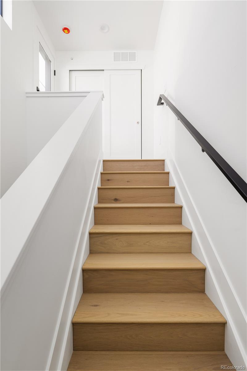 4517 Tennyson Street Denver, CO 80212 - Photo 28 of 34 a view of entryway and white walls