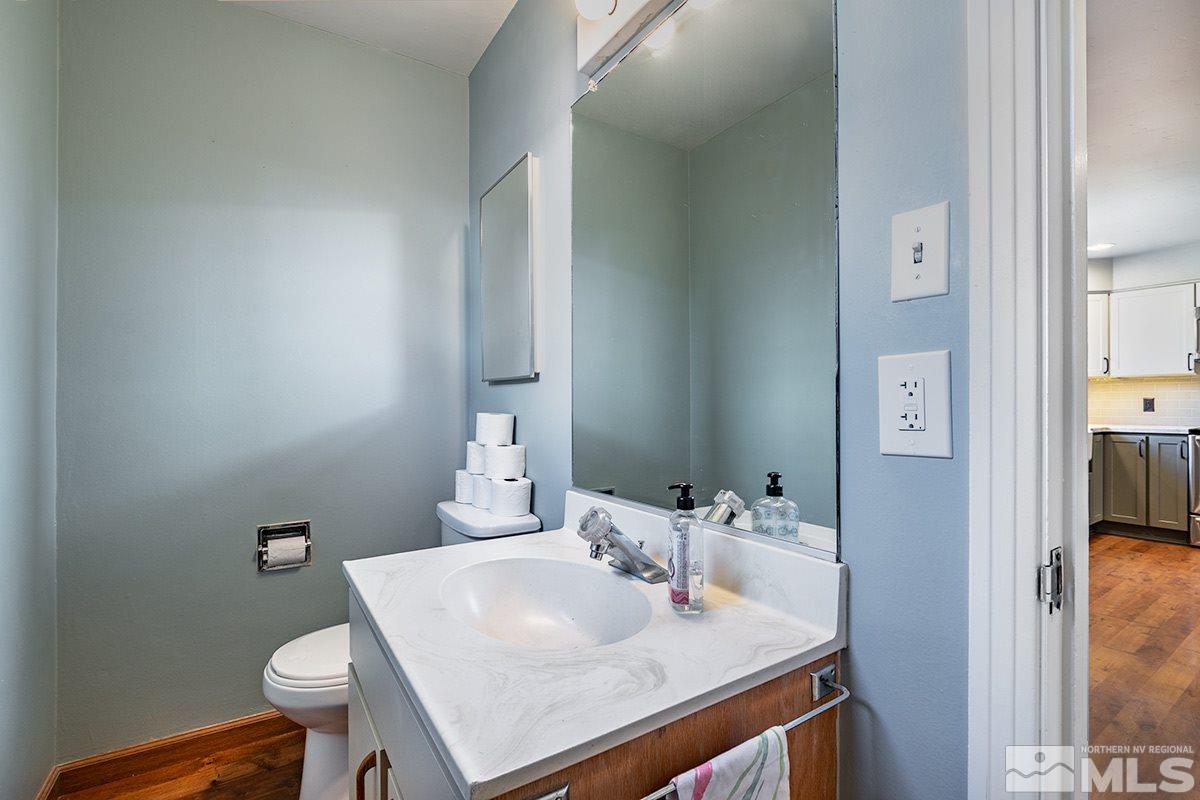 845 West 11th Street Reno, NV 89503 - Photo 14 of 23 a bathroom with a sink toilet and vanity