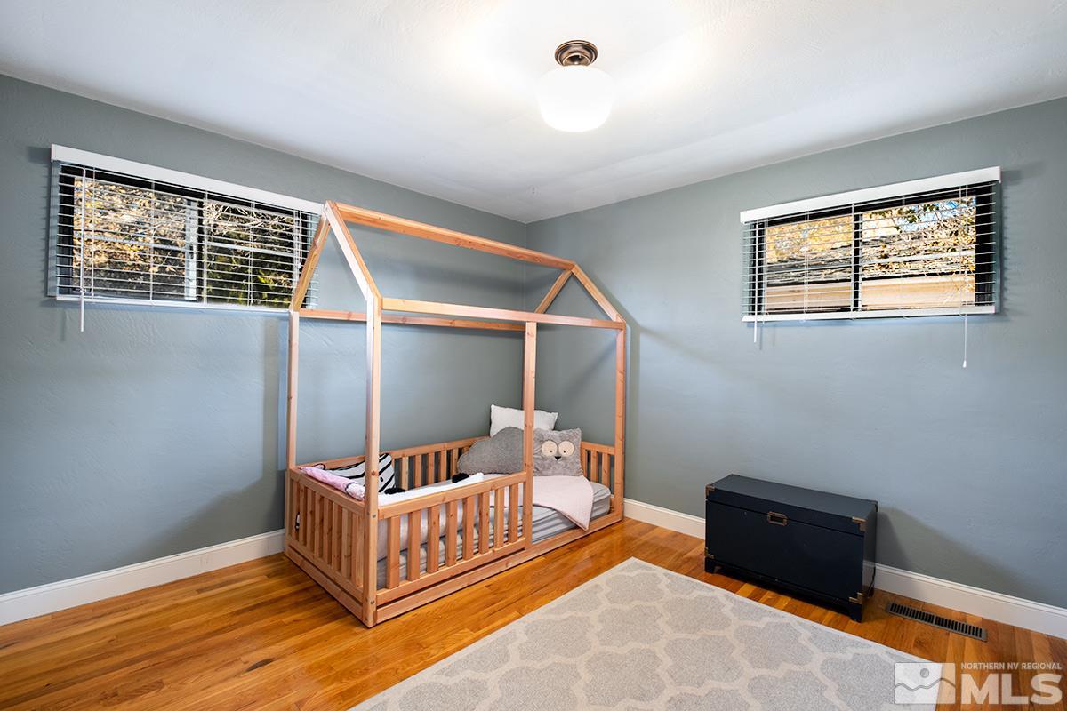 845 West 11th Street Reno, NV 89503 - Photo 15 of 23 a bedroom with furniture and a window