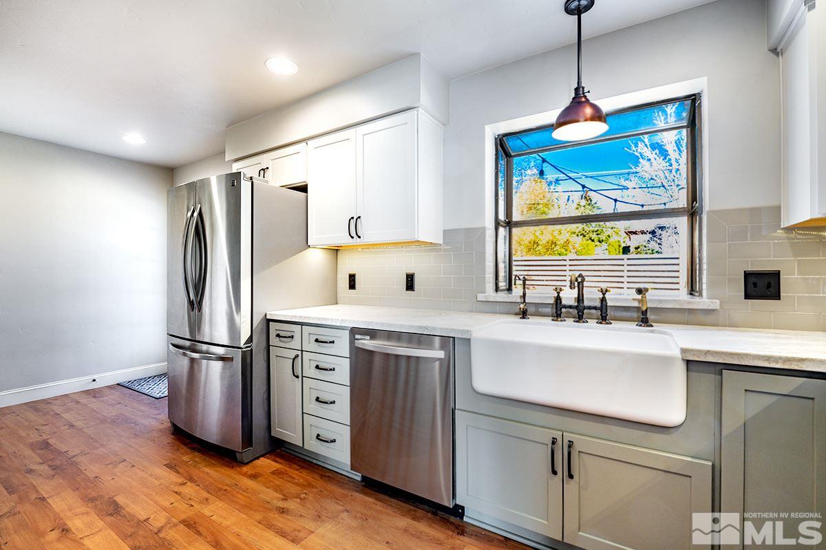 845 West 11th Street Reno, NV 89503 - Photo 10 of 23 a kitchen with appliances cabinets and a sink