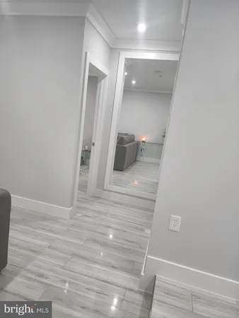 a view of a hallway with entryway