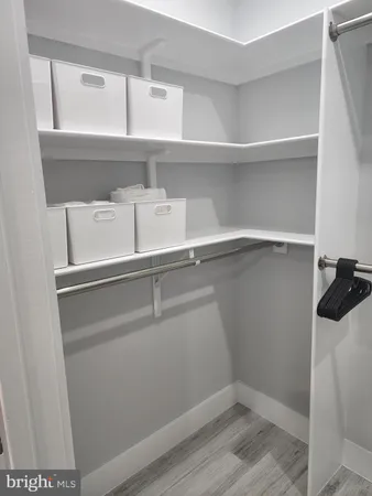 a view of an empty walk in closet