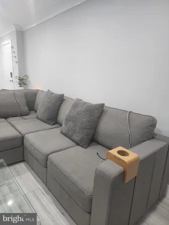 a living room with a couch and a couch
