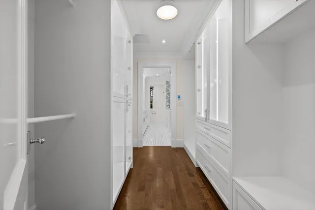 a view of a bathroom from the hallway