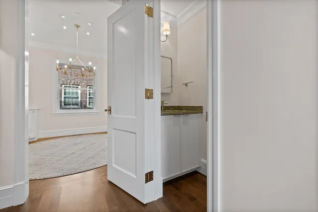 a view of entryway with wooden floor