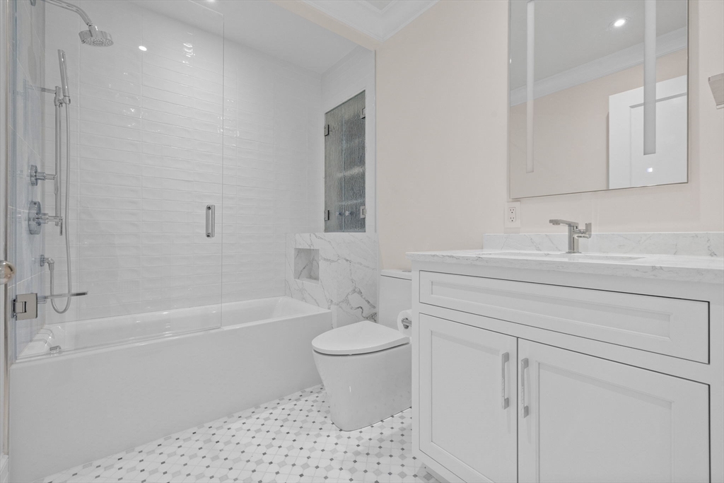 2 Byron Street Boston, MA 02108 - Photo 23 of 30 a bathroom with a sink a toilet and a bathtub