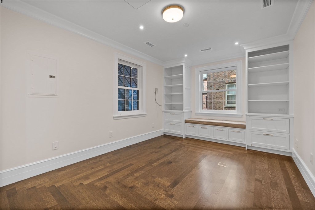 2 Byron Street Boston, MA 02108 - Photo 24 of 30 wooden floor in an empty room with a window