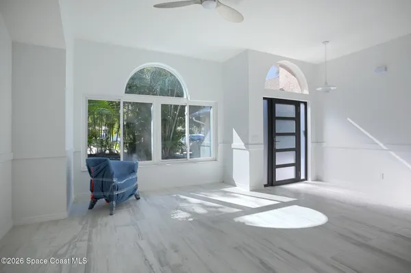 a view of livingroom with furniture and window