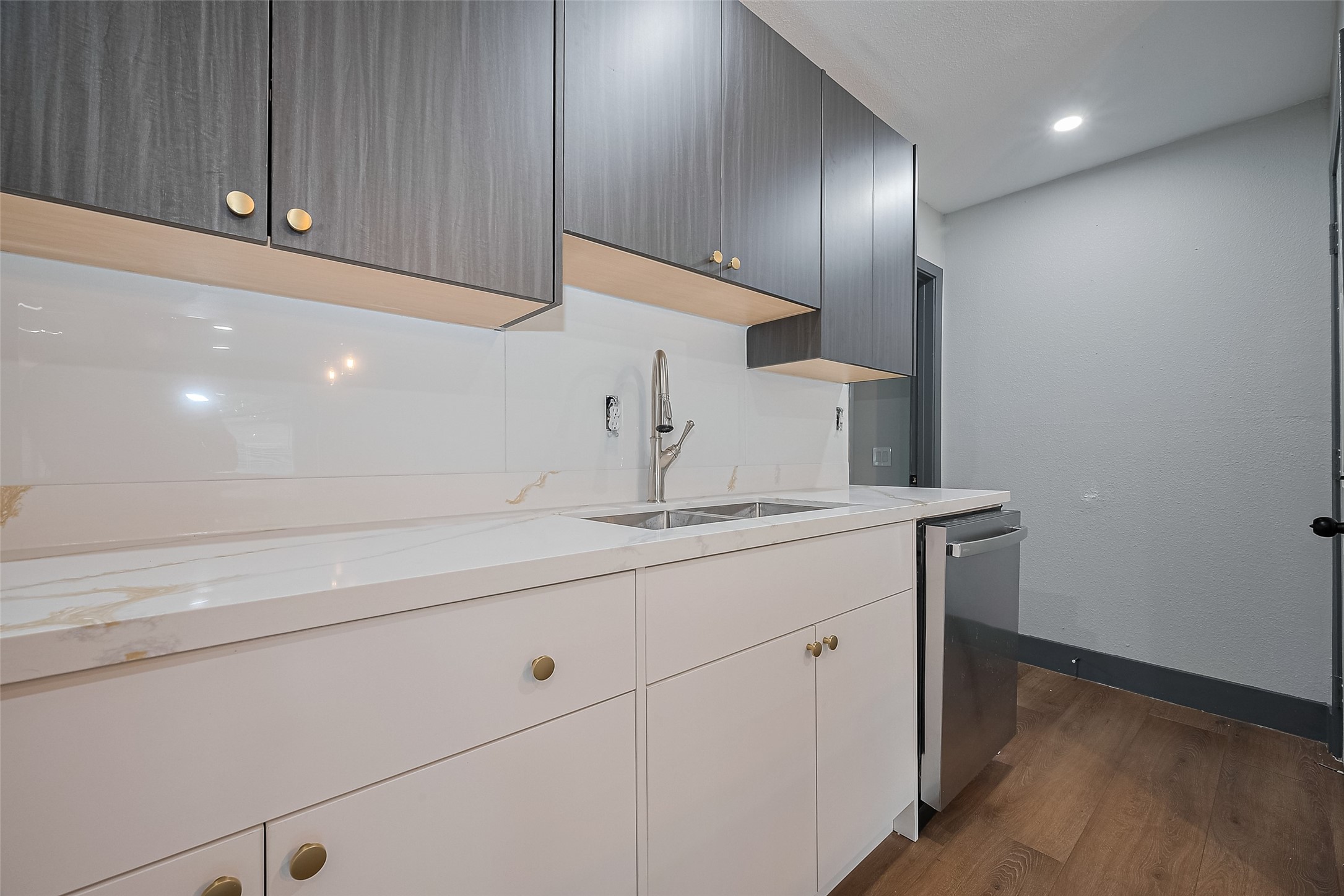6058 Lyndhurst Drive Houston, TX 77033 - Photo 16 of 50 a bathroom with a sink and a mirror