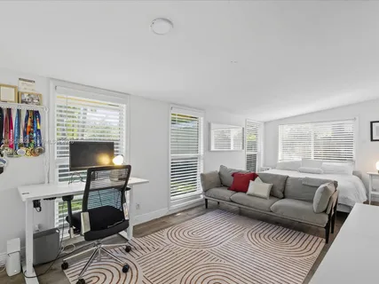 a very nice looking dining room with a table and chairs