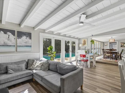 a view of a dining room with furniture window and outside view