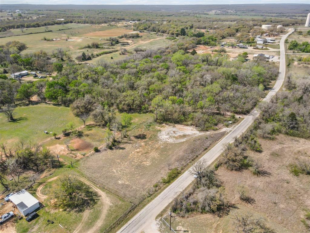 4 County Road 3855 Poolville, TX 76487 - Photo 12 of 13 a view of a lake with a mountain