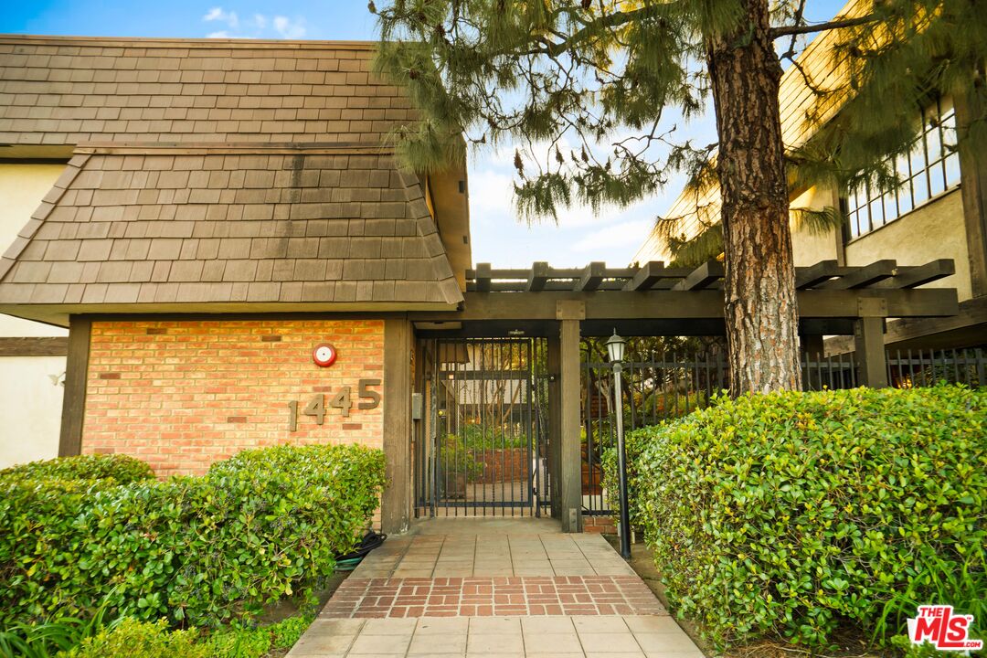1445 Valley View Road, Unit 2 Glendale, CA 91202 - Photo 2 of 36 a front view of a house with a yard