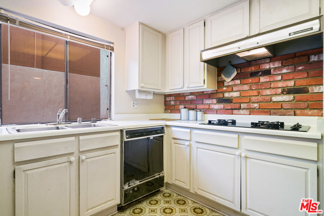 1445 Valley View Road, Unit 2 Glendale, CA 91202 - Photo 16 of 36 a kitchen with appliances cabinets and a sink