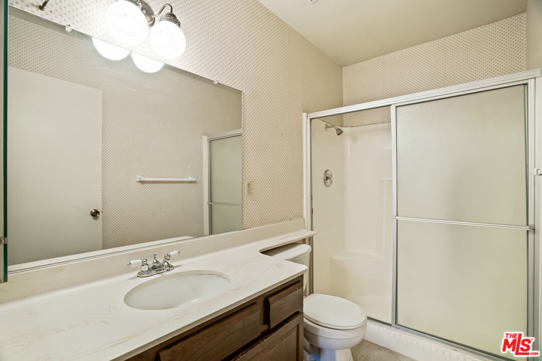 1445 Valley View Road, Unit 2 Glendale, CA 91202 - Photo 25 of 36 a bathroom with a sink toilet and shower