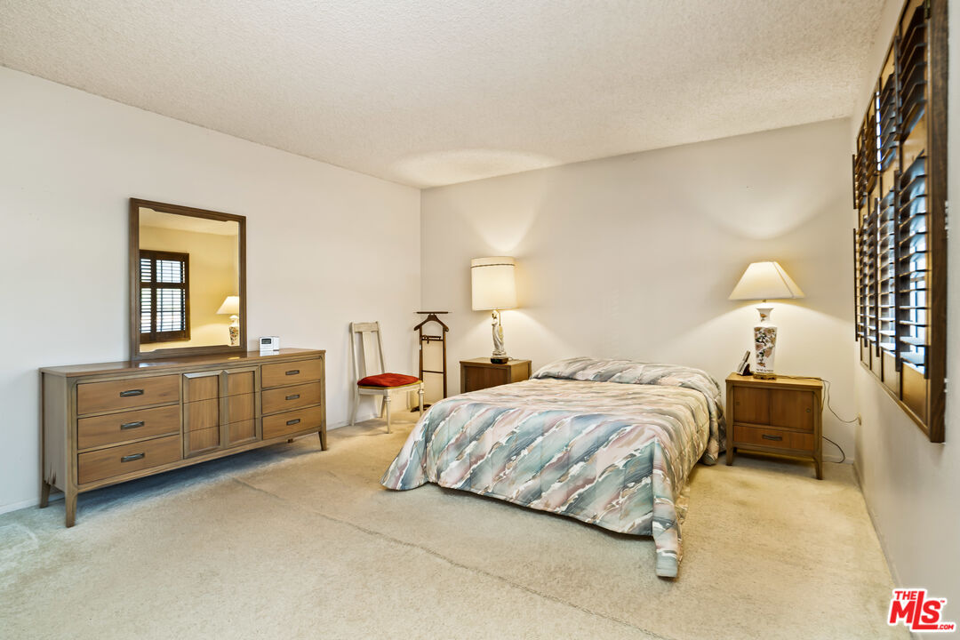 1445 Valley View Road, Unit 2 Glendale, CA 91202 - Photo 29 of 36 a bedroom with a bed and a dresser